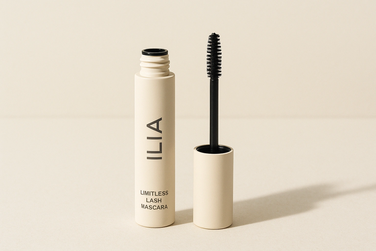 Realistic photo-style image of the iconic ILIA Limitless Lash Mascara, highlighting its sleek packaging as a top choice for organic, non-toxic mascara.